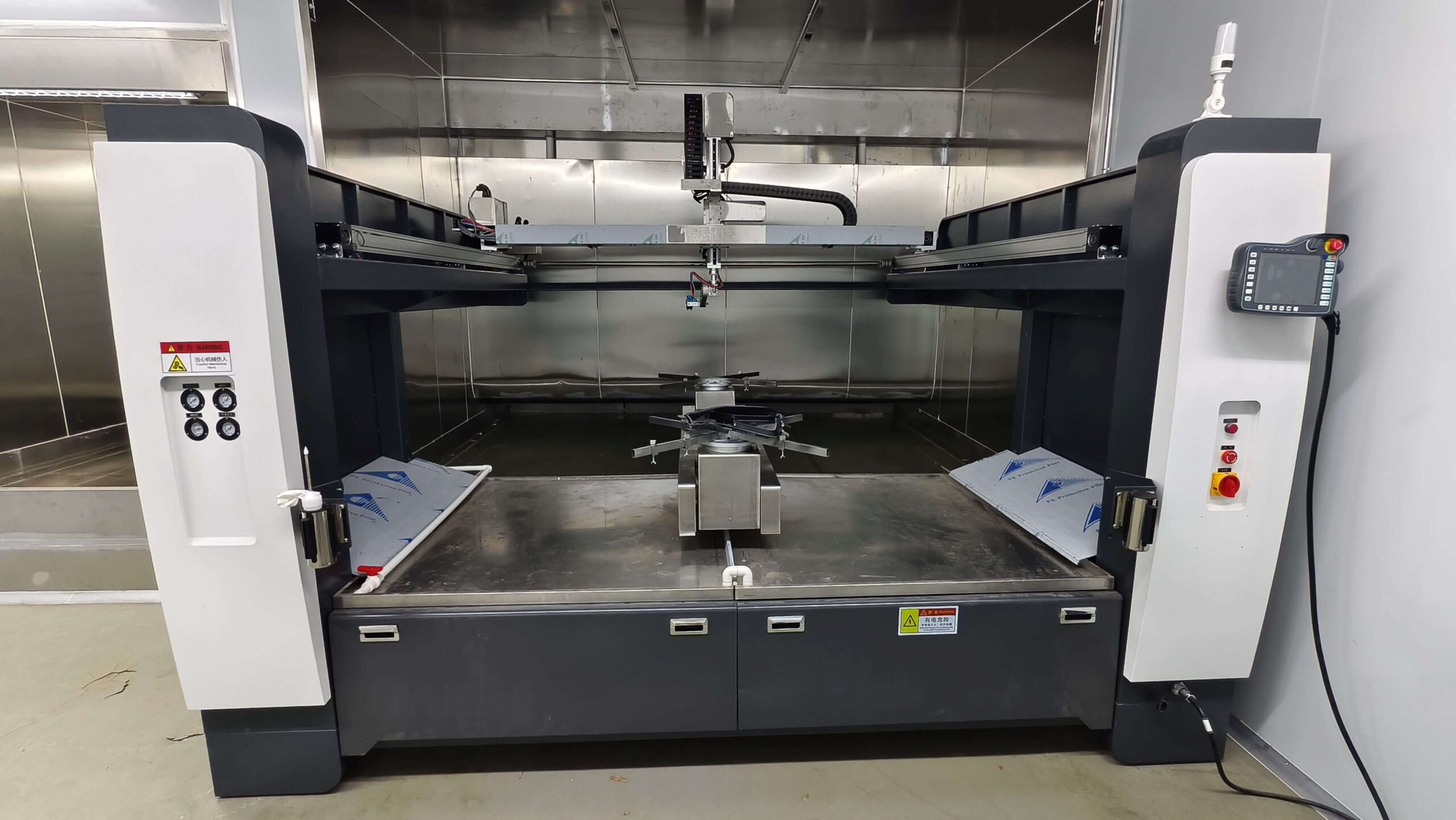 Robotic spray coating equipment for carbon fiber production at JCSPORTLINE